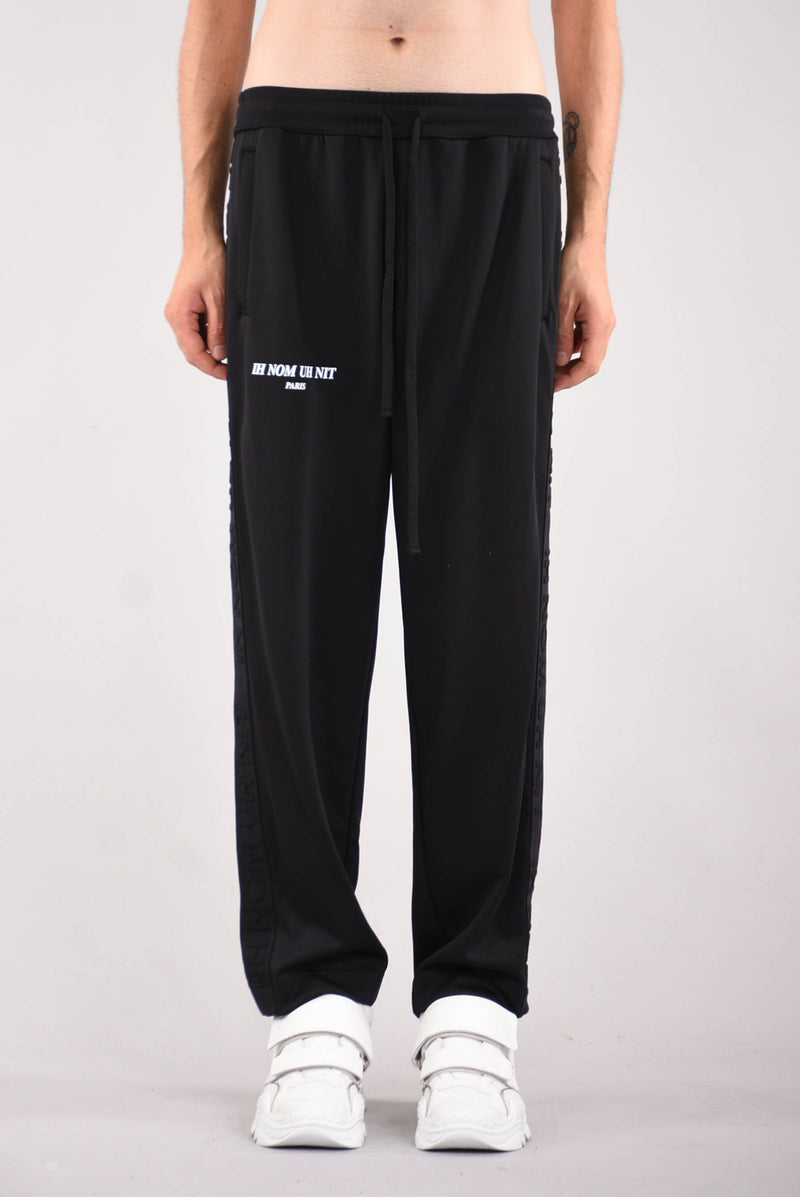 IH NOM UH NIT Track pants whit logo band