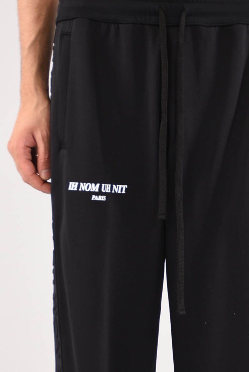 IH NOM UH NIT Track pants whit logo band